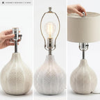 Signature Design by Ashley Rainermen Casual Ceramic Table Lamp, Transparent White Glaze Finish, Drum Hardback Fabric Shade, 11" W x 11" D x 21" H, Off White