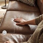 Signature Design by Ashley Shadsburne Rustic Faux Leather Sofa with Nailhead Trim and 2 Throw Pillows, Brown